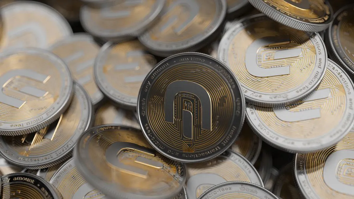 Close-up of multiple gold and silver cryptocurrency coins symbolizing digital currency and finance.