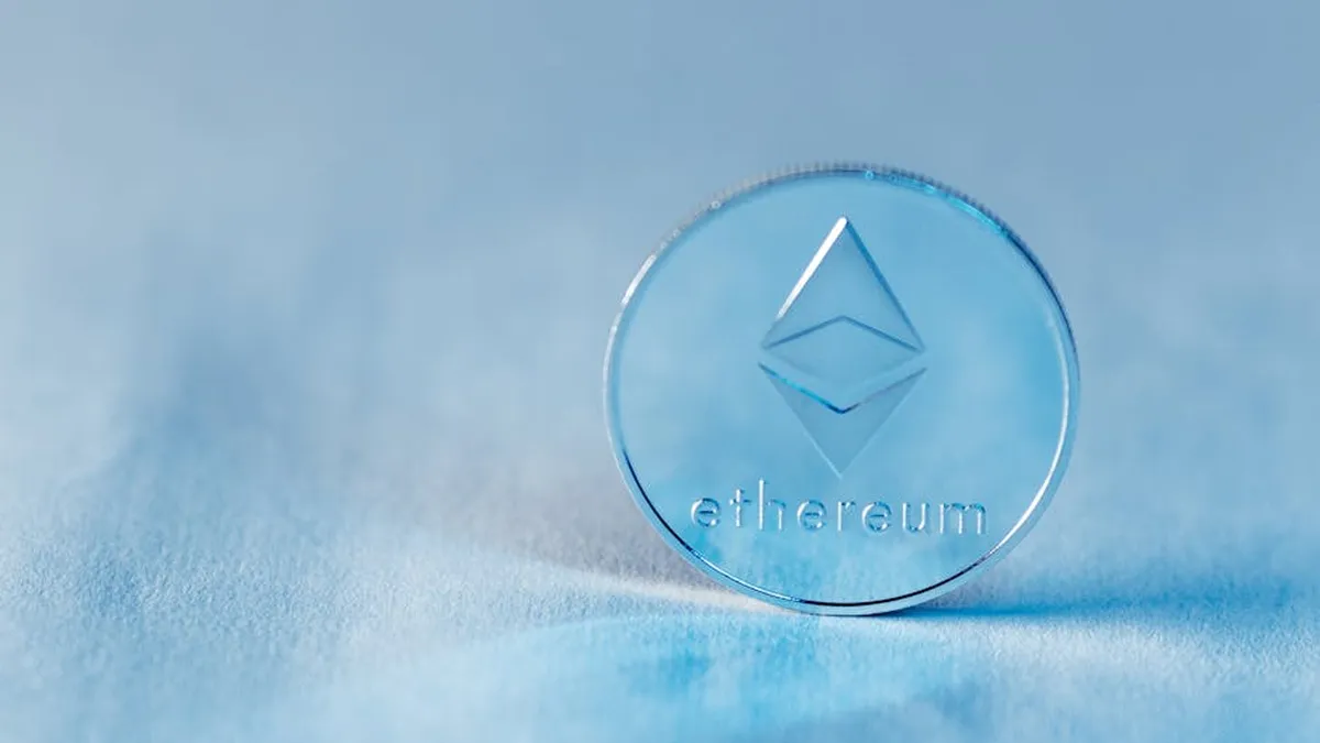 Close-up of a transparent Ethereum coin symbolizing blockchain technology and modern finance.