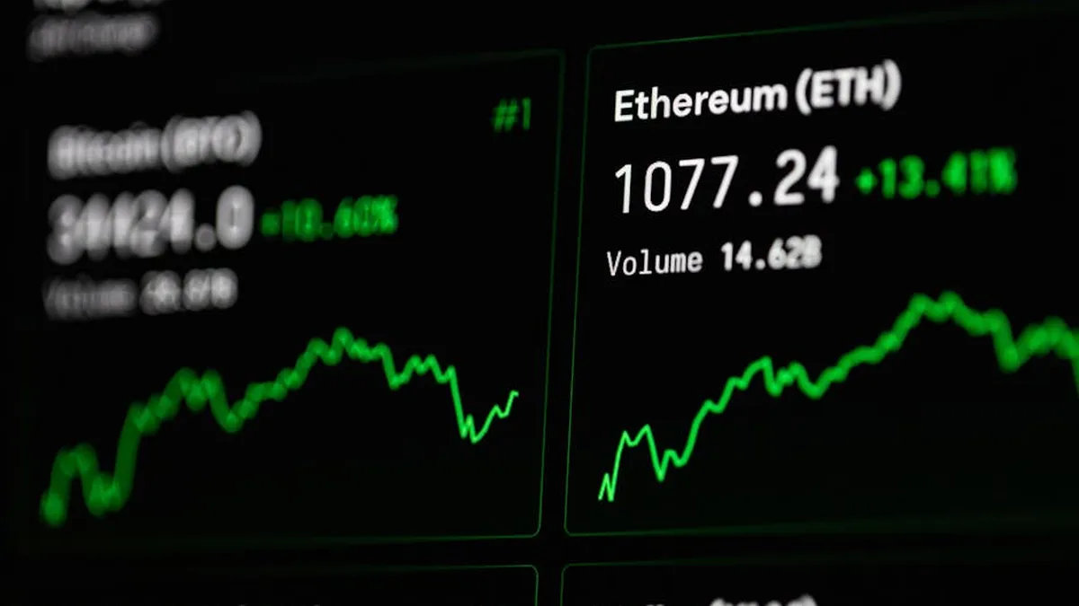 Close-up of cryptocurrency market data with Ethereum and Bitcoin prices on screen.